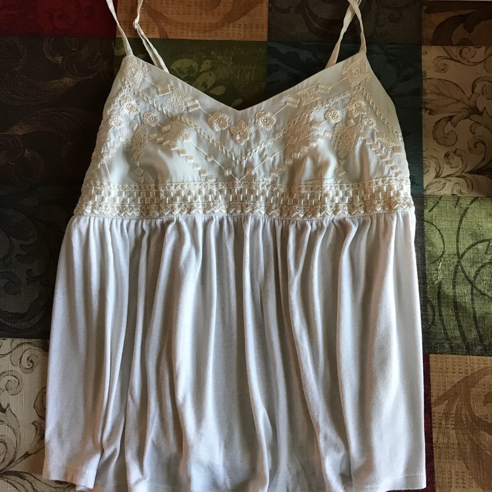 Super cute ivory swing tank